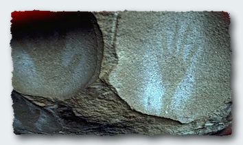 Aboriginal hand prints on a cave wall in Australia.